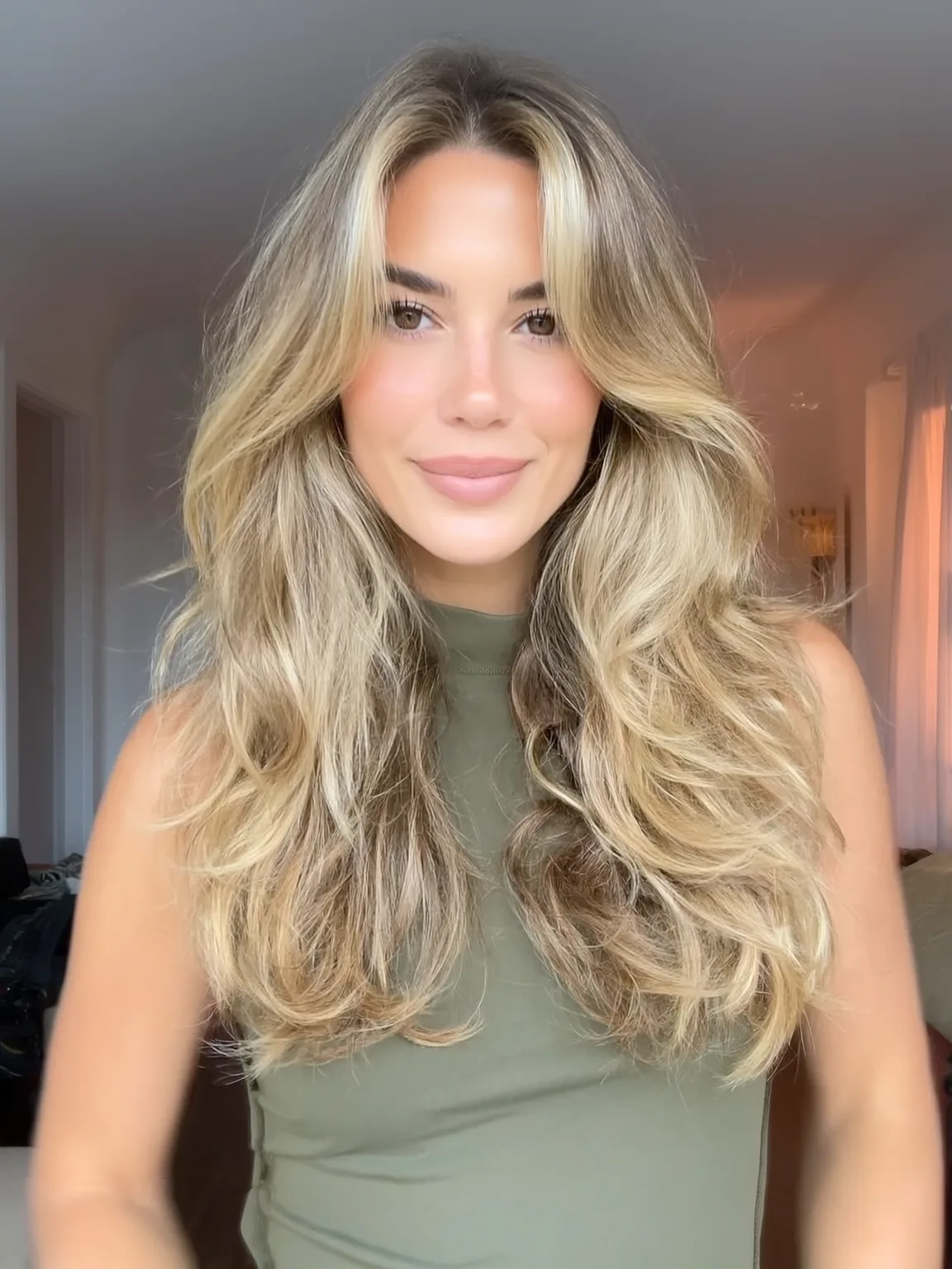 Voluminous Long Layers with Honey Blonde Balayage